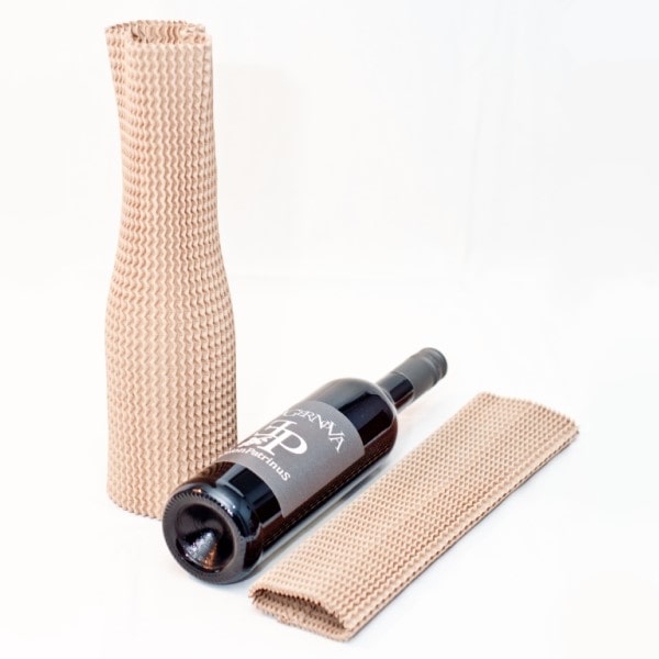 A wine bottle with a cardboard bottle protector